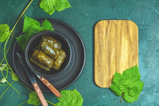 Traditional Middle Eastern dolma or tolma or sarma. Latin American Mexican Chilean cuisine ninos envueltos. Grape leaves stuffed with meat and rice. Lebanon turkish greek middle eastern cuisine.