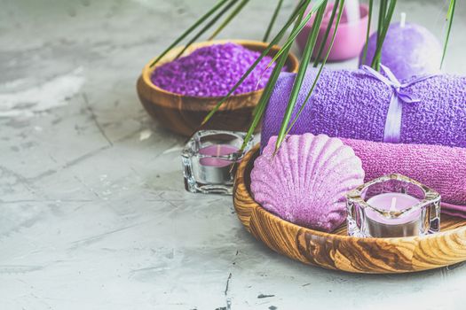Spa composition with violet color, space for text. Natural cosmetics and wellness concept.