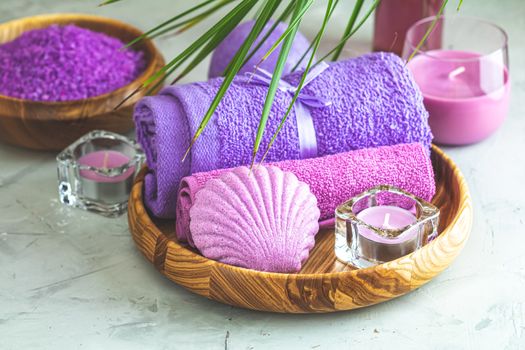 Spa composition with violet color, space for text. Natural cosmetics and wellness concept.