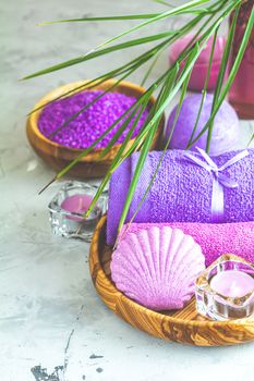 Spa composition with violet color, space for text. Natural cosmetics and wellness concept.
