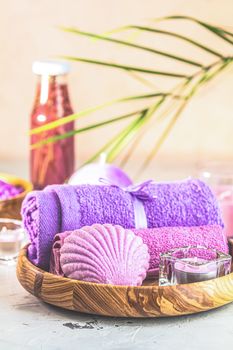 Spa composition with violet color, space for text. Natural cosmetics and wellness concept.