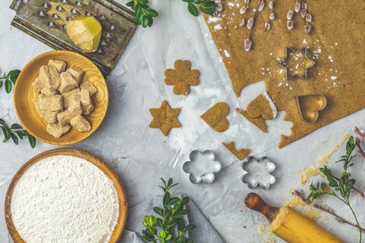 Culinary Spring or Christmas food background. Ingredients for ginger cookies. Dough for baking. View from above.