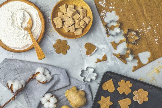 Culinary Spring or Christmas food background. Ingredients for ginger cookies. Dough for baking. View from above.