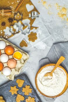 Culinary Spring or Christmas food background. Ingredients for ginger cookies. Dough for baking. View from above.