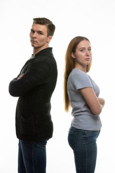 The couple got into a fight and standing with their backs to each other in the frame