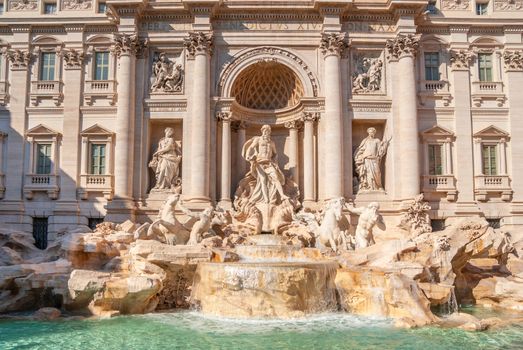 Trevi Fountain, Rome, Italy. Trevi Fountain is one of the main tourist attractions in the city. Beautiful view of Trevi Fontana in summer. Ornate baroque architecture of Trevi, nice Roma landmark.