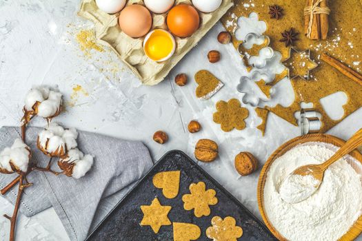 Culinary Spring or Christmas food background. Ingredients for ginger cookies. Dough for baking. View from above.