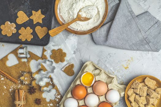 Culinary Spring or Christmas food background. Ingredients for ginger cookies. Dough for baking. View from above.