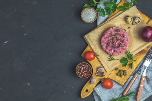 Healthy food, cooking concept. Homemade raw organic Ground beef Burger steak patties cutlet with vegetables. Copy space background, top view flat lay.