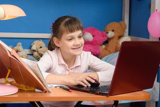 Girl joyfully studying at school without leaving home
