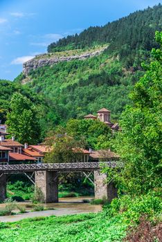 Vladischkiyat bridge over the Yantra River near Veliko Tarnovo Fortress, Bulgaria. Big size panoramic view on a sunny summer day