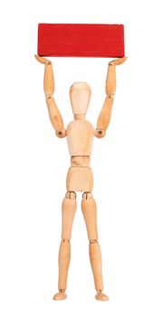 Wooden mannequin carrying a wooden block, isolated on white