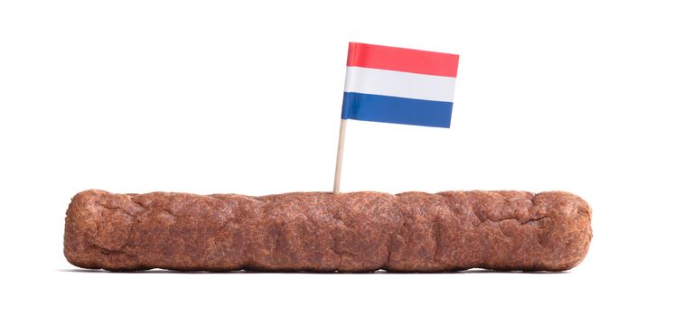 One frikadel, a Dutch fast food snack, isolated