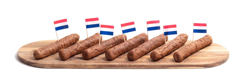 Wooden tray with frikadellen, a Dutch fast food snack, isolated