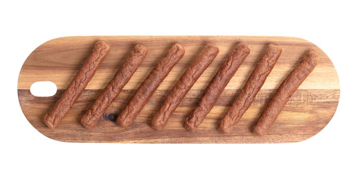 Wooden tray with frikadellen, a Dutch fast food snack, isolated