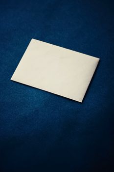 Blank beige paper card on blue background, premium business and luxury brand identity mockup