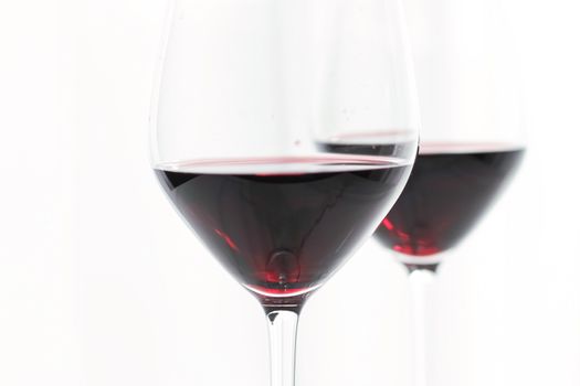 Two crystal glasses of red wine, organic beverage product