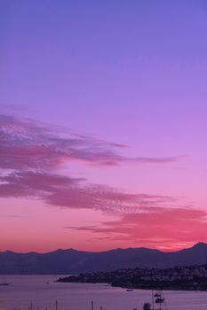 Beautiful sea view and mountains in the Mediterranean at sunset, summer vacation travel and holiday destination