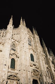 Milan Cathedral known as Duomo di Milano, historical building and famous landmark in Lombardy region in Northern Italy at night