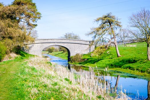 Scenic View of on the Lancster Canal Bathed in Warm Morning Sunlight Running through Cumbria England