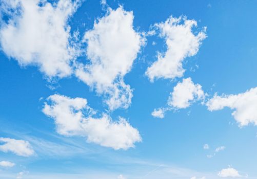 Bright blue sky with clouds, nature and environmental background