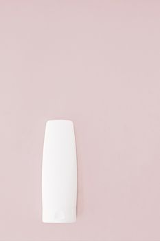 Moisturizing hand cream or body lotion on pink background, beauty product and skin care cosmetics, flatlay