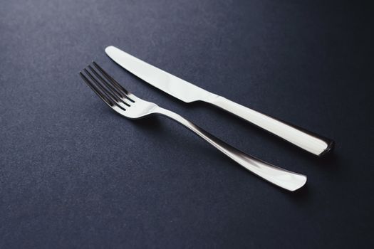 Fork and knife, silver cutlery for table decor, minimalistic design and diet concept