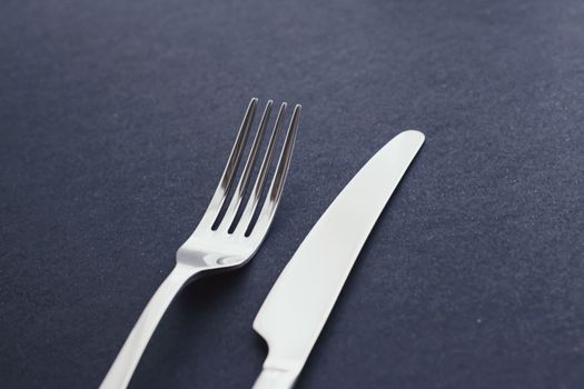 Fork and knife, silver cutlery for table decor, minimalistic design and diet concept