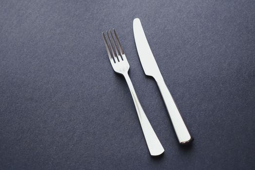 Fork and knife, silver cutlery for table decor, minimalistic design and diet concept