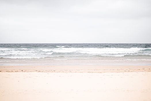 Beautiful sea or ocean waves, coast view from tropical sand beach, summer vacation travel and holiday destination scene