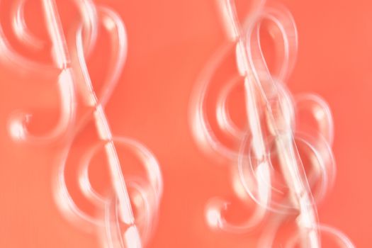 double exposure silvered clef on red background UK