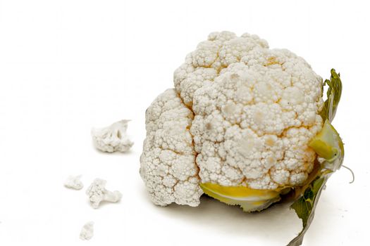 Close up shot of fresh raw cauliflower vegetable isolated on white background. Horizontal shot.