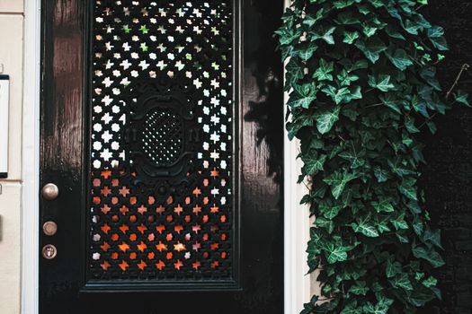 Architectural detail of a building on the main city center street of Amsterdam in Netherlands, european architecture