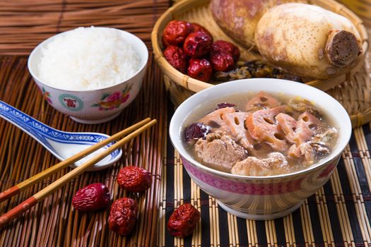 Chinese traditional lotus root soup with pork meat and red dates