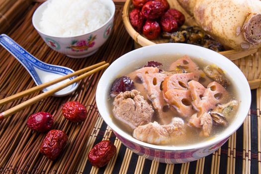 Chinese traditional lotus root soup with pork meat and red dates