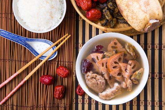 Chinese traditional lotus root soup with pork meat and red dates