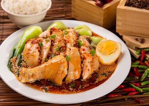 hot and spicy chicken serve with white rice