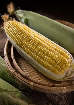 Organic yellow corn on wood