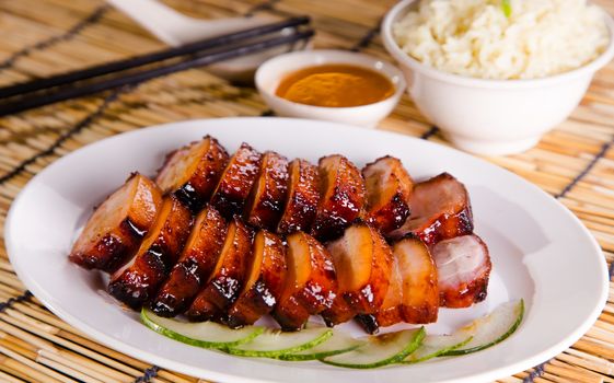 chinese bbq sweet pork serve with rice