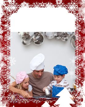 Father baking cookies with his children against christmas themed frame