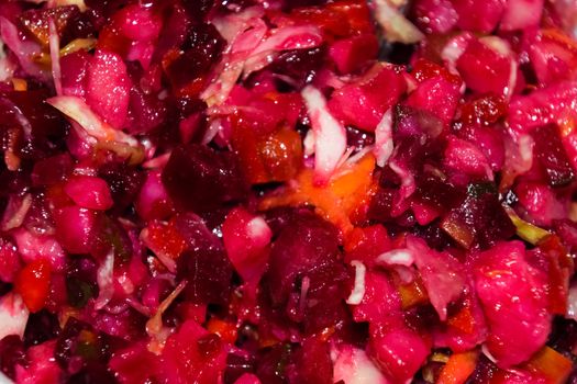 Beetroot vinaigrette in a plate on the table. Useful salad