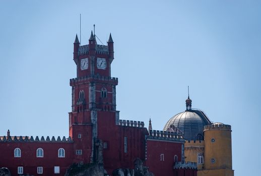 Pena Palace monument on the hilltop seen from the Castle of the Moors near Sintra in Portugal