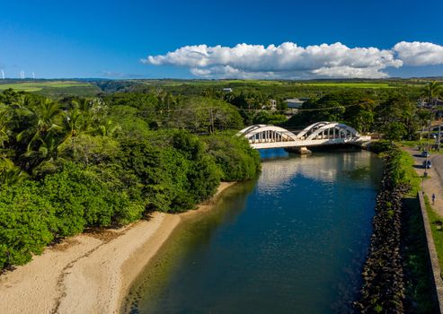 Aerial shot of the river anahulu and the twin arched road bridge in the North Shore town of Haleiwa