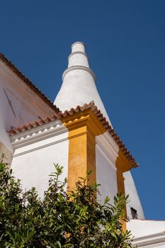 Large white kitchen chimney on the roof of the National Palace in Sintra near Lisbon