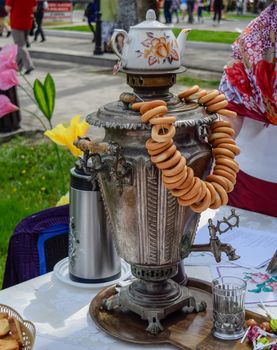 A samovar with bagels on the table. People's traditional festival.