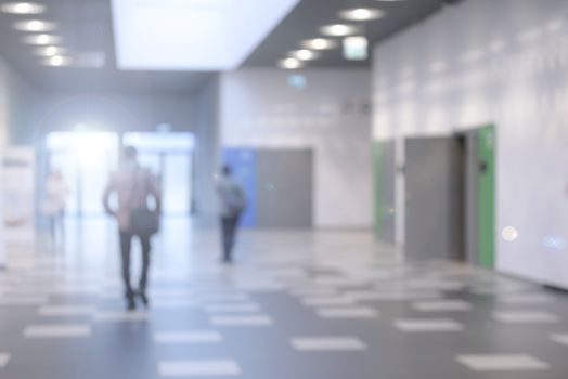 Corridor in a modern business center or a university hall - defocused with bokeh lights