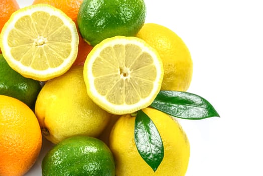 Overhead shot of different tropical fruits collection on white background.