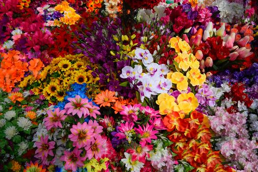 The flower shop counter. Lots of different colors.