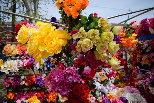 The flower shop counter. Lots of different colors.