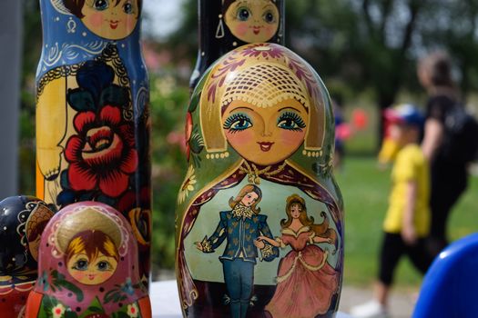 The matryoshkas are on the table. National Russian art painted matryoshkas.